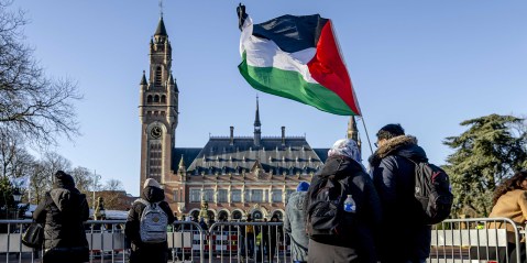 People in front of the Peace Palace ahead of a ruling by the International Court of Justice (ICJ) on a request from South Africa for emergency measures for Gaza, in The Hague, Netherlands, 26 January 2024. (Photo: EPA-EFE/Remko de Waal)